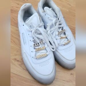 Cardi B Reebok White Athletic Shoes with Gold Accents